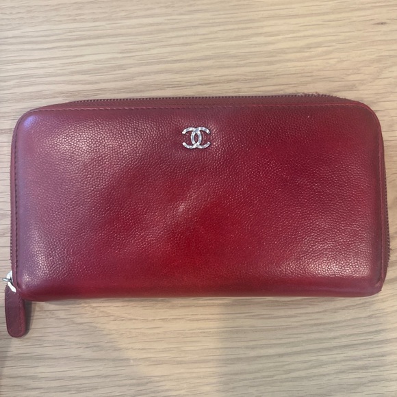 CHANEL Handbags - AUTHENTIC CHANEL red calfskin/lamb skin leather zip around wallet.